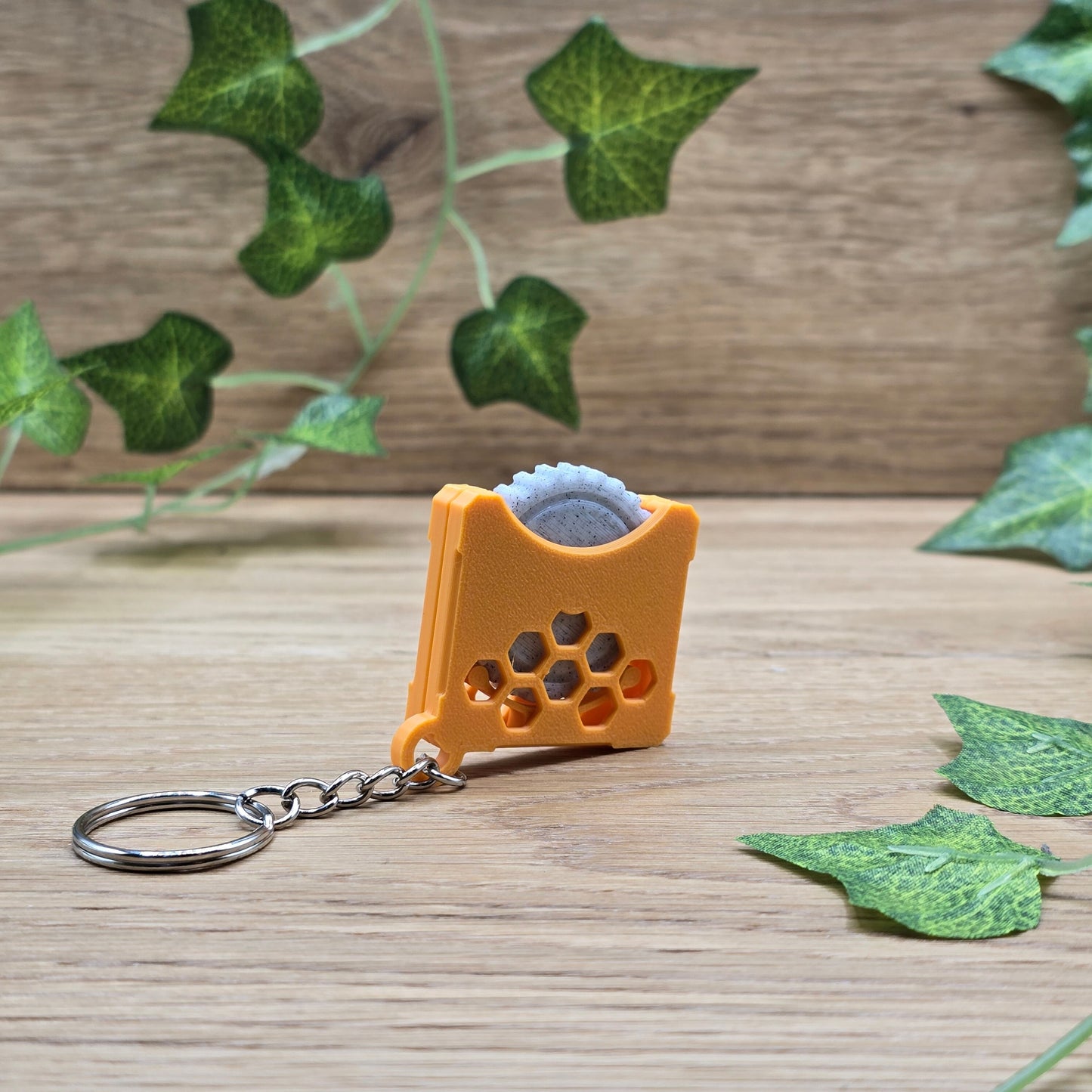 Stressspielzeug "Fidget Wheel" - Orange - Schlüsselanhänger mit Drehrad zum Stress reduzieren und rumspielen- Grau/Orange