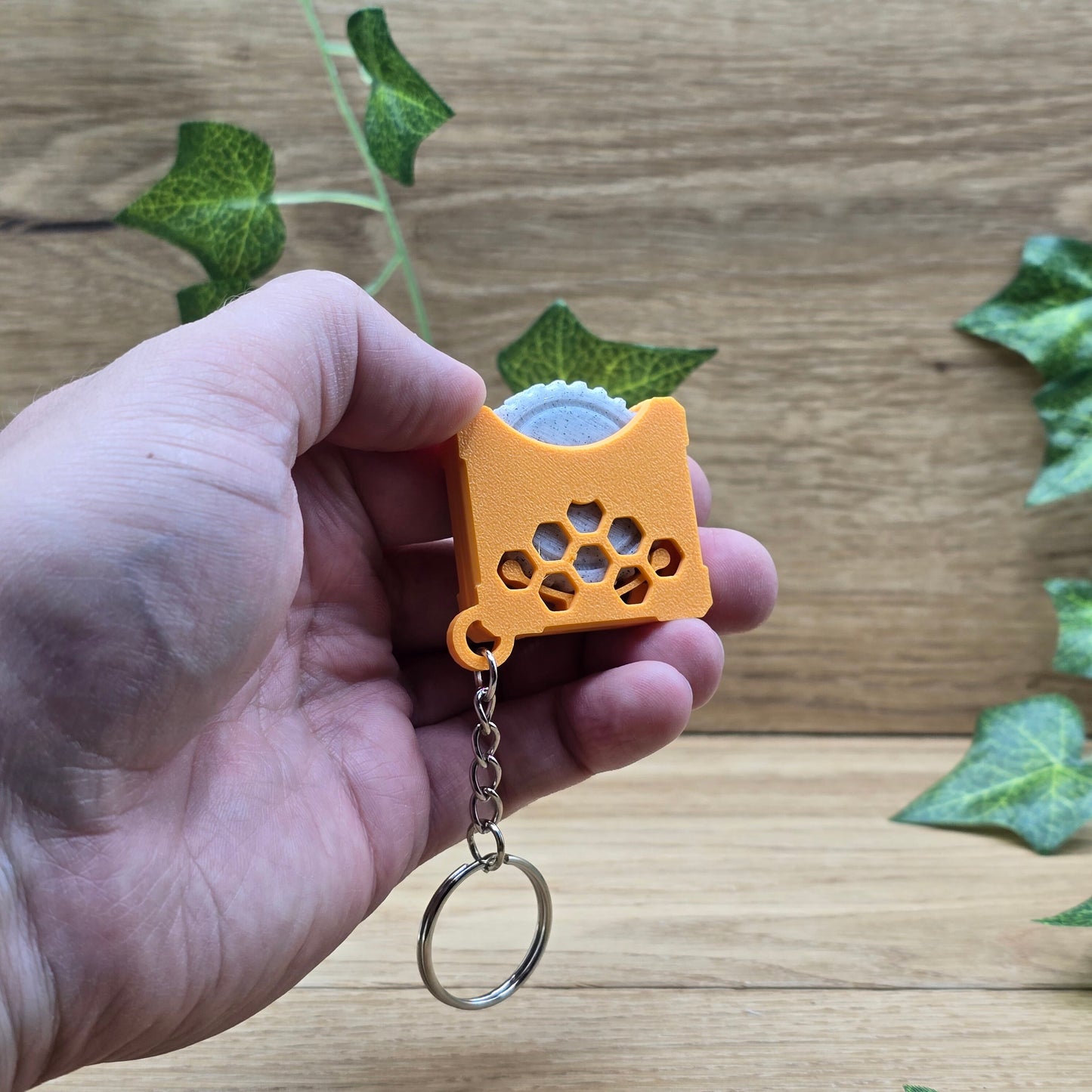 Stressspielzeug "Fidget Wheel" - Orange - Schlüsselanhänger mit Drehrad zum Stress reduzieren und rumspielen- Grau/Orange