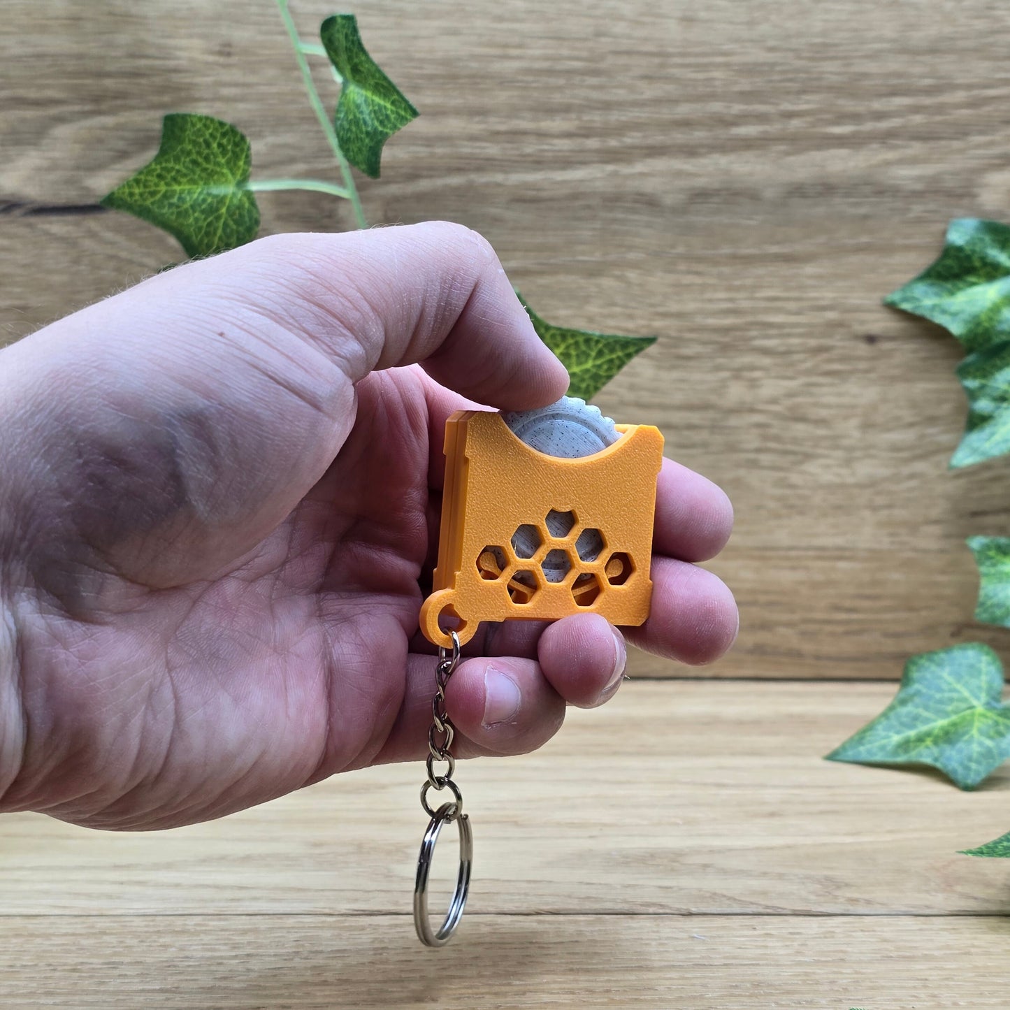 Stressspielzeug "Fidget Wheel" - Orange - Schlüsselanhänger mit Drehrad zum Stress reduzieren und rumspielen- Grau/Orange