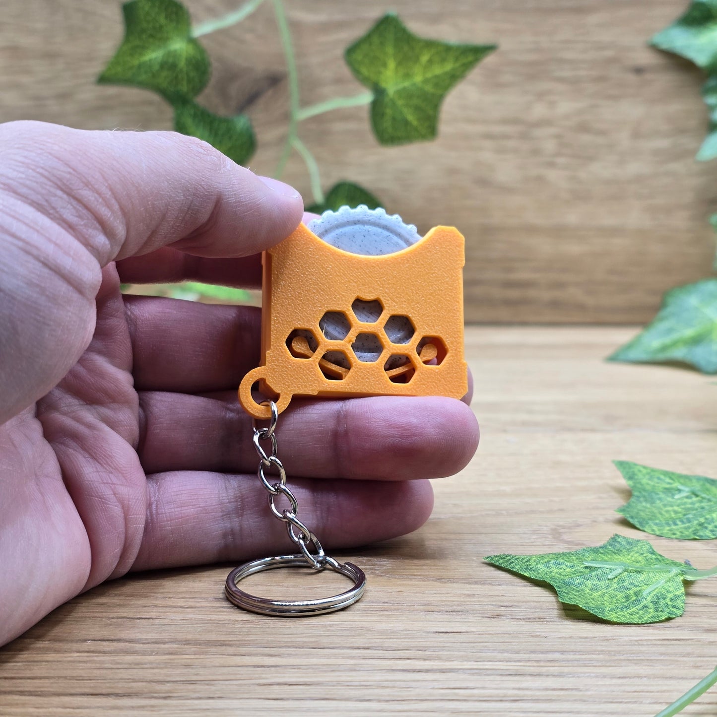 Stressspielzeug "Fidget Wheel" - Orange - Schlüsselanhänger mit Drehrad zum Stress reduzieren und rumspielen- Grau/Orange